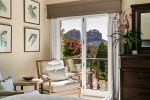 A serene escape with a small patio and stunning views